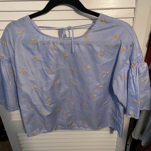 Blue and white striped and floral top. With 3/4 sleeves